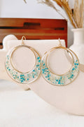 Handmade clear resin hoop earrings with pressed white Queen Anne's lace flowers and pearl accents