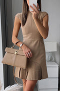Camel cap-sleeve high-neck mini dress with a structured pleated patchwork hem