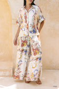 Woman in a multicolor linen-blend short-sleeve maxi shirt dress for vacation