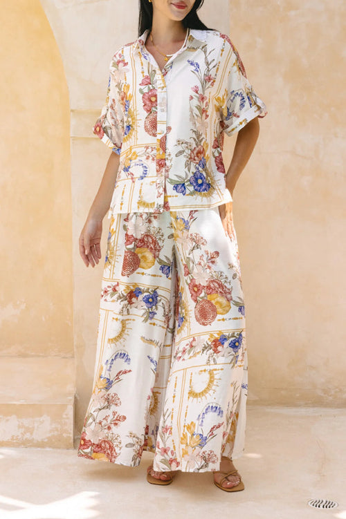 Woman in a multicolor linen-blend short-sleeve maxi shirt dress for vacation