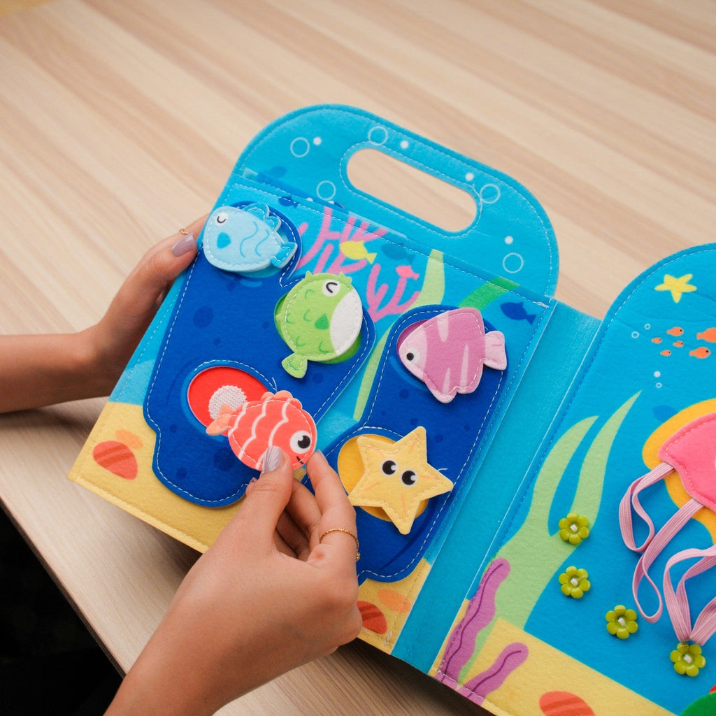 Blue Ocean Quiet Book with Handle — Shark Hideout, Squeaky Crab & Shape Fish Matching