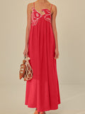 Red pleated camisole dress featuring a fish-shaped 3D embroidered bodice.