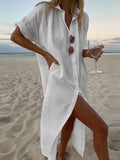 Solid color casual long sleeved mid length cotton and linen shirt dress