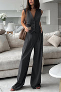 Model in a charcoal sleeveless V-neck waistcoat and high-waist wide-leg trousers set