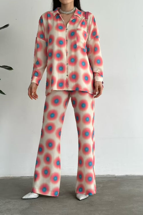 Cream satin-look long-sleeve shirt and flared pants set with retro coral and blue dot print