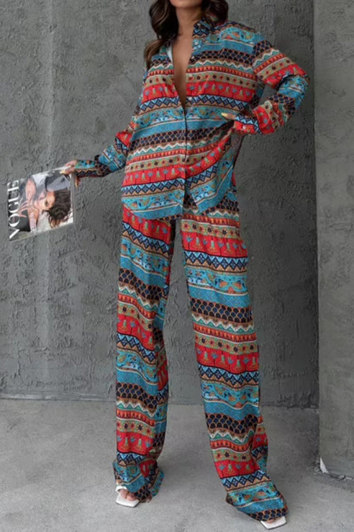 Woman in multicolor Aztec-print linen-blend long-sleeve shirt and matching wide-leg pants set