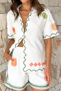 Crisp white short-sleeve collared shirt and matching shorts two-piece vacation set
